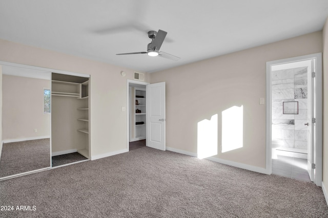 unfurnished bedroom with carpet floors, ceiling fan, and a closet