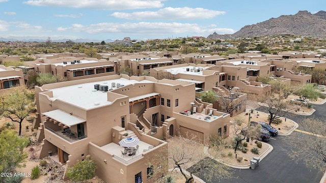 birds eye view of property featuring a residential view and a mountain view