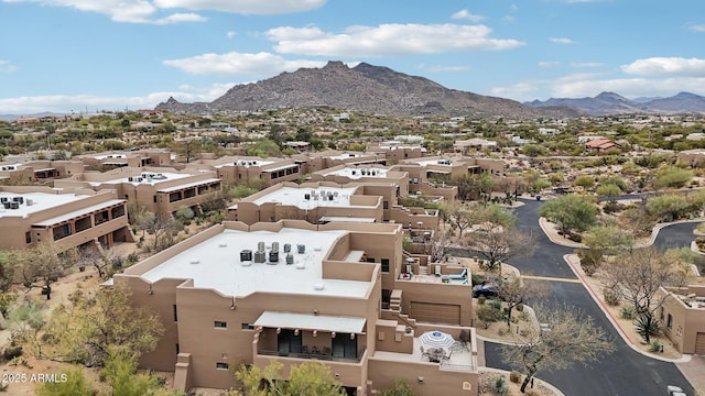 drone / aerial view with a residential view and a mountain view