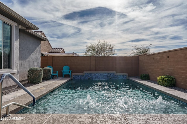 view of swimming pool with pool water feature