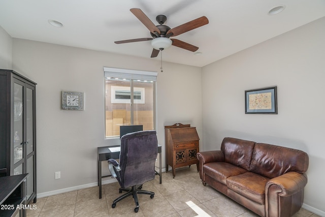 tiled office space with ceiling fan