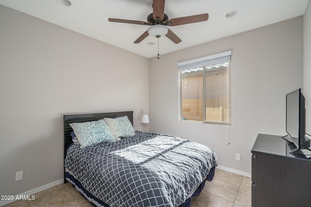 bedroom with light tile patterned floors and ceiling fan