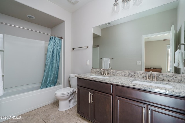 full bathroom with tile patterned flooring, vanity, shower / bath combination with curtain, and toilet