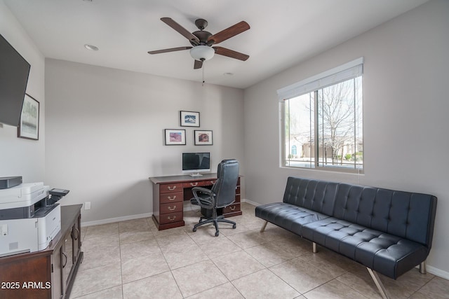 office space featuring light tile patterned floors and ceiling fan