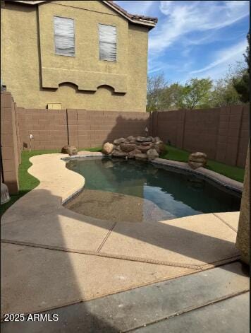 9621 N 82nd Ln, Peoria, AZ 85345 - view of swimming pool with a fenced backyard and a patio