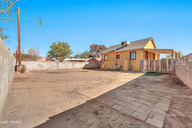 rear view of property with a patio area