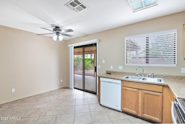 2112 E Donald Dr, Phoenix, AZ 85024 - kitchen with dishwasher, a sink, stove, ceiling fan, and light countertops