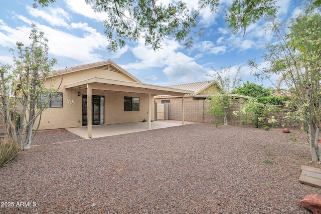 2112 E Donald Dr, Phoenix, AZ 85024 - back of house with a fenced backyard, a patio, and stucco siding