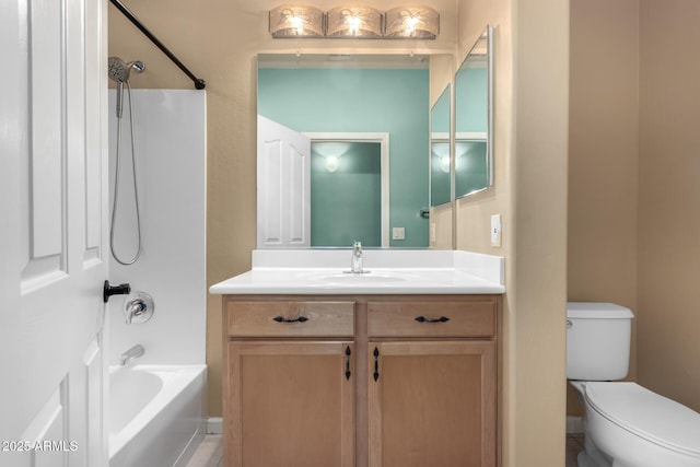 full bathroom with washtub / shower combination, toilet, and vanity