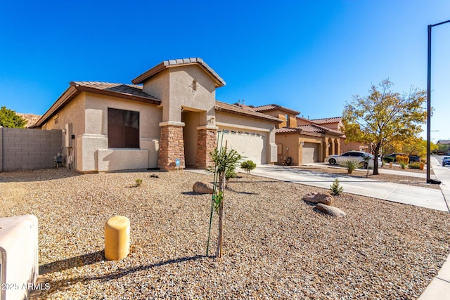 view of front of home with a garage