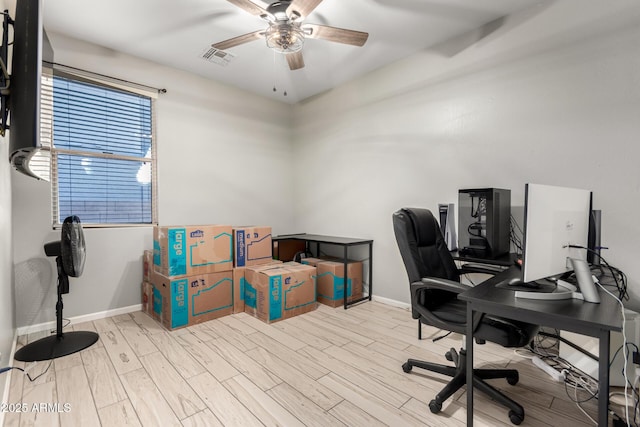 office area with light hardwood / wood-style floors and ceiling fan