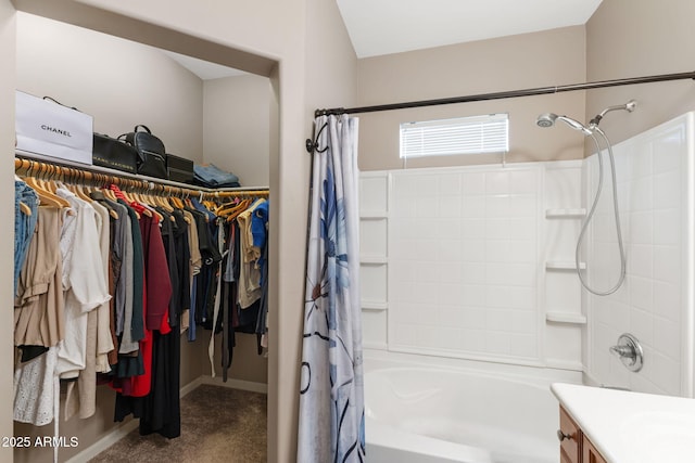 bathroom featuring vanity and shower / bath combo