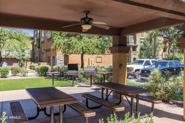 view of patio featuring ceiling fan