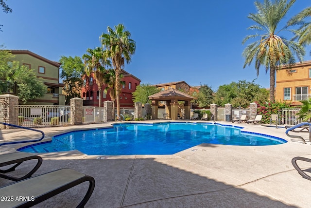 view of swimming pool with a gazebo and a patio