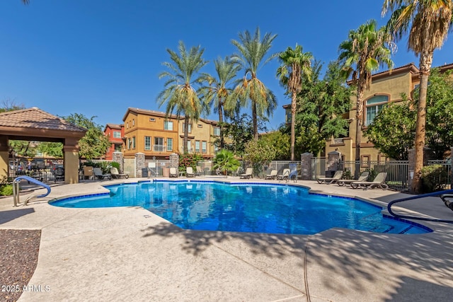 view of pool featuring a gazebo and a patio area