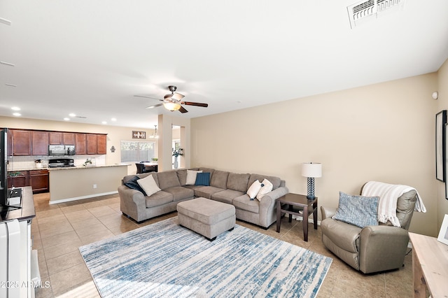 living area featuring recessed lighting, visible vents, a ceiling fan, and light tile patterned flooring