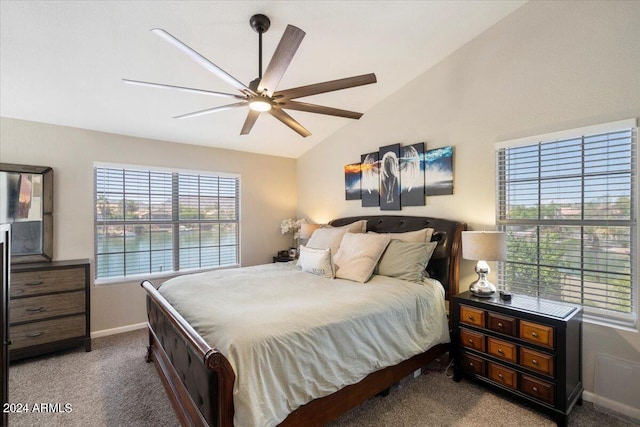 carpeted bedroom featuring ceiling fan and lofted ceiling