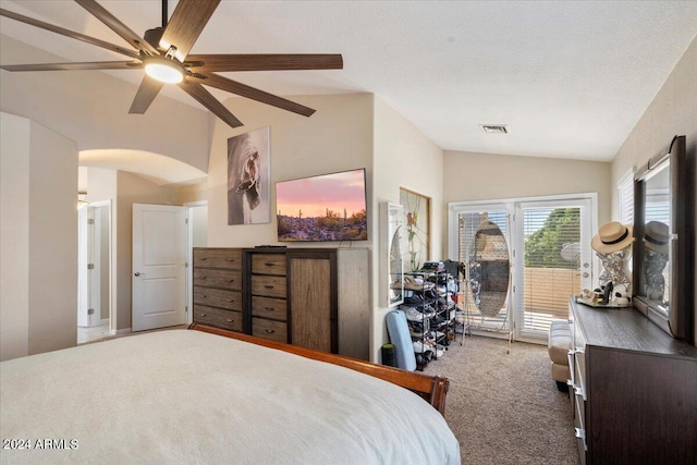 bedroom with carpet flooring, ceiling fan, access to outside, and vaulted ceiling