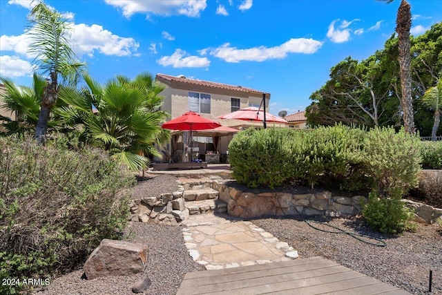 back of house featuring a patio area