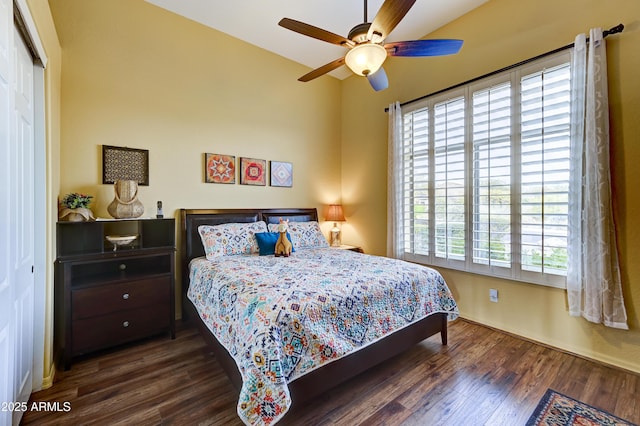 bedroom featuring a closet, ceiling fan, and wood finished floors