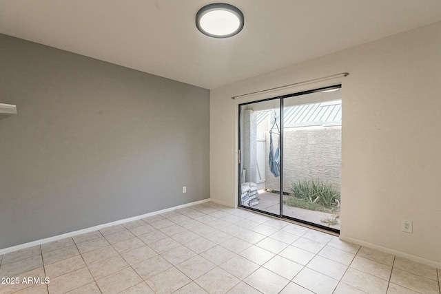 view of tiled spare room