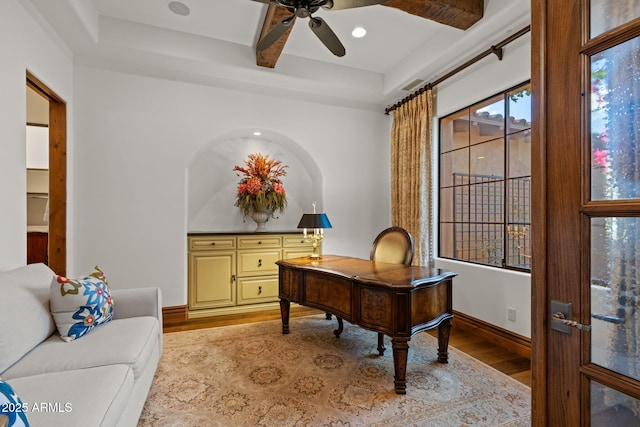 office featuring ceiling fan and light hardwood / wood-style flooring