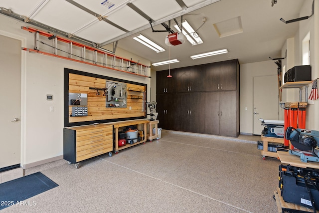 garage featuring a garage door opener