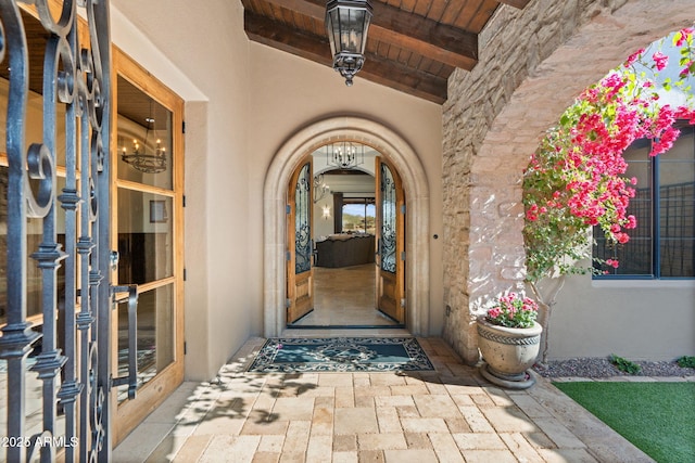 property entrance featuring french doors