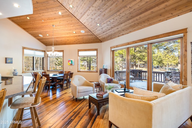 living area with recessed lighting, wood ceiling, a chandelier, and hardwood / wood-style flooring