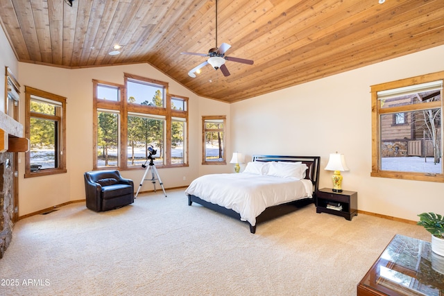 bedroom featuring wooden ceiling, multiple windows, baseboards, and carpet floors