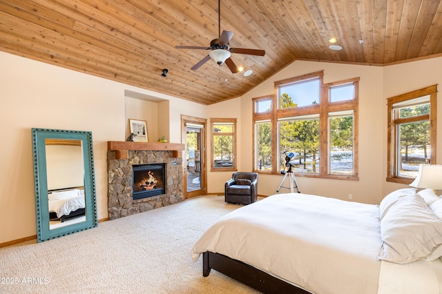 bedroom with carpet flooring, wooden ceiling, a fireplace, and access to exterior