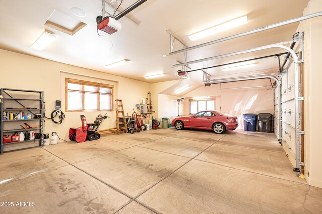 garage featuring a garage door opener