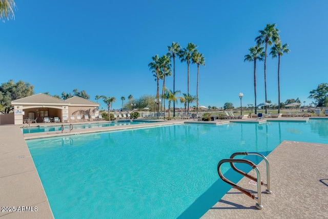 view of swimming pool featuring a patio area