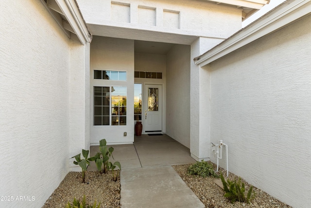 doorway to property with a patio area