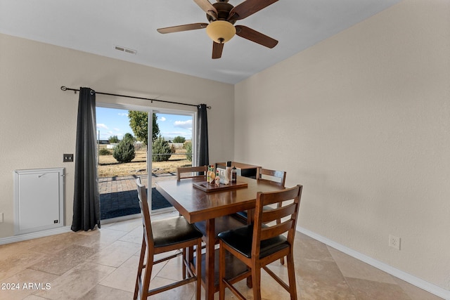 dining space with ceiling fan