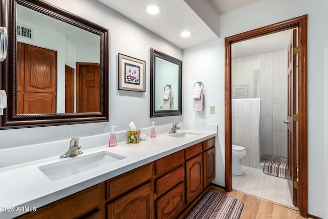 9243 W Kimberly Way, Peoria, AZ 85382 - full bath featuring a sink, tiled shower, toilet, and double vanity