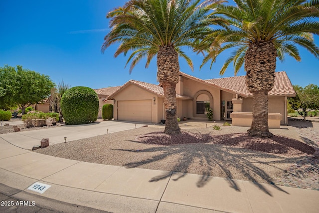 9243 W Kimberly Way, Peoria, AZ 85382 - view of front of house with a garage, stucco siding, driveway, and a tile roof