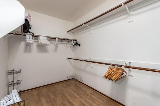 9243 W Kimberly Way, Peoria, AZ 85382 - walk in closet featuring wood finished floors