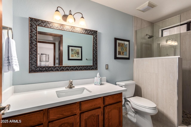9243 W Kimberly Way, Peoria, AZ 85382 - full bath with a walk in shower, vanity, toilet, and visible vents