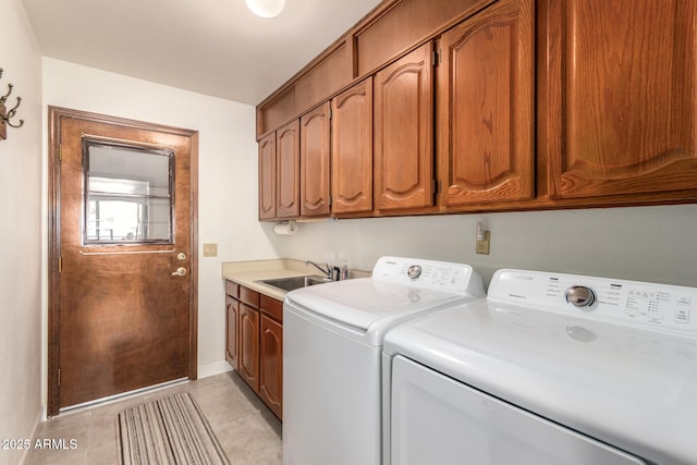 9243 W Kimberly Way, Peoria, AZ 85382 - laundry area with independent washer and dryer, cabinet space, a sink, baseboards, and light tile patterned floors