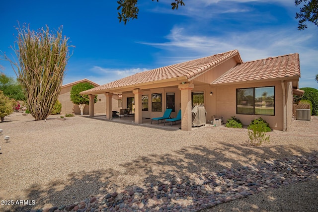 9243 W Kimberly Way, Peoria, AZ 85382 - rear view of house featuring a patio, stucco siding, and a tiled roof