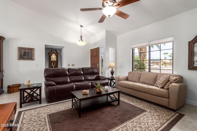 9243 W Kimberly Way, Peoria, AZ 85382 - living room featuring a ceiling fan and high vaulted ceiling