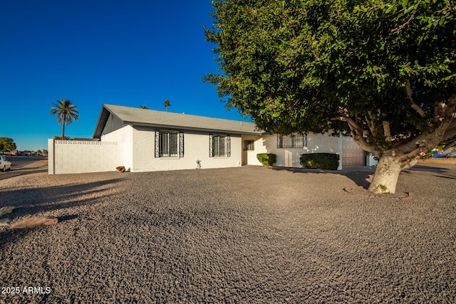 view of front of home featuring a garage