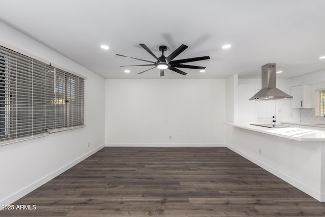 interior space featuring dark hardwood / wood-style floors and ceiling fan