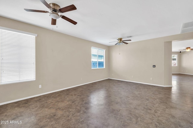 11318 W Monte Vista Rd, Avondale, AZ 85392 - empty room featuring a ceiling fan and baseboards