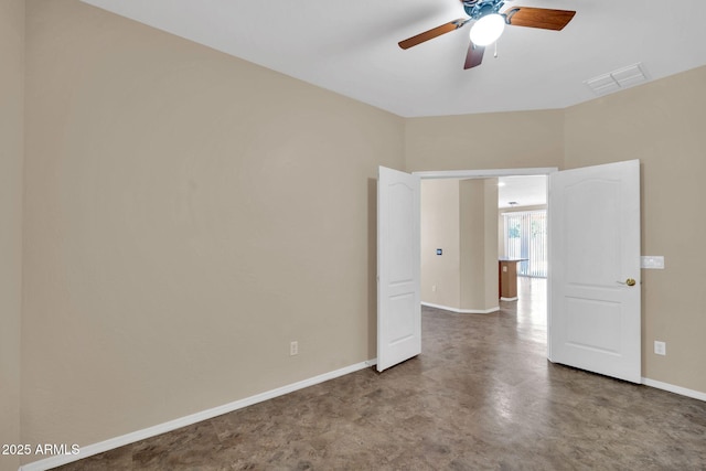 11318 W Monte Vista Rd, Avondale, AZ 85392 - unfurnished room with ceiling fan and finished concrete flooring