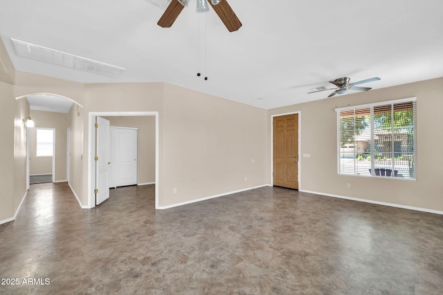 11318 W Monte Vista Rd, Avondale, AZ 85392 - spare room with a ceiling fan, arched walkways, and concrete flooring