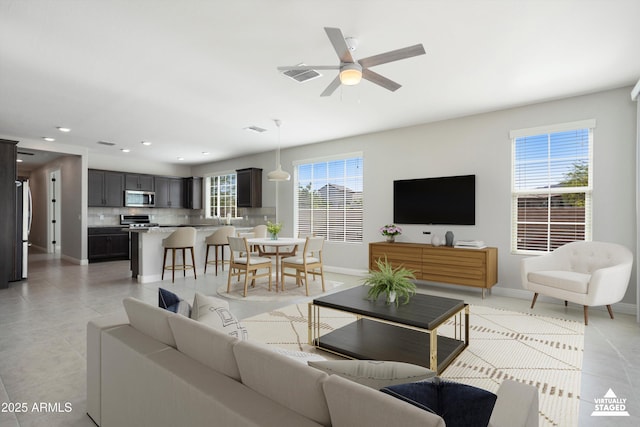 20644 W Mariposa St, Buckeye, AZ 85396 - living area with recessed lighting, a ceiling fan, baseboards, and light tile patterned floors