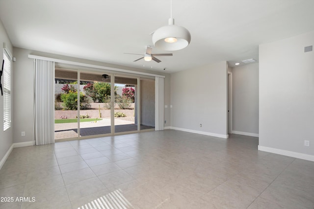20644 W Mariposa St, Buckeye, AZ 85396 - unfurnished room featuring ceiling fan, baseboards, and light tile patterned floors