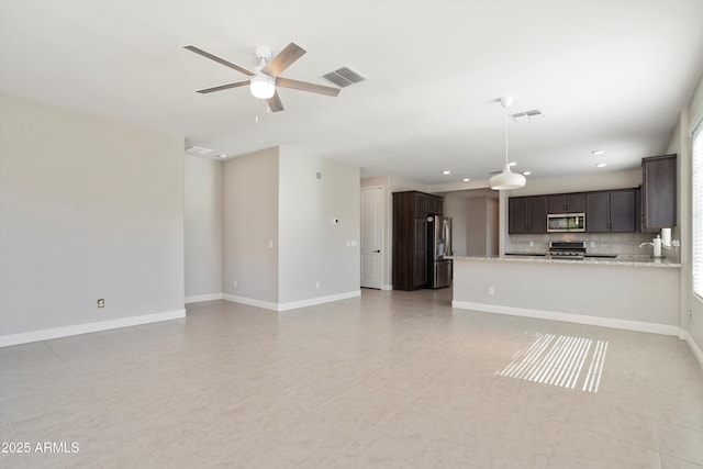 20644 W Mariposa St, Buckeye, AZ 85396 - unfurnished living room with a ceiling fan, baseboards, a sink, recessed lighting, and light tile patterned flooring